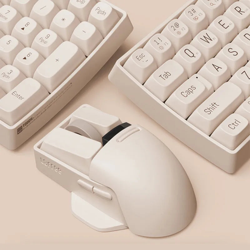 Tofu coloured Xiaoqiao wireless mouse on a desk, showing its ergonomic shape and seven buttons.