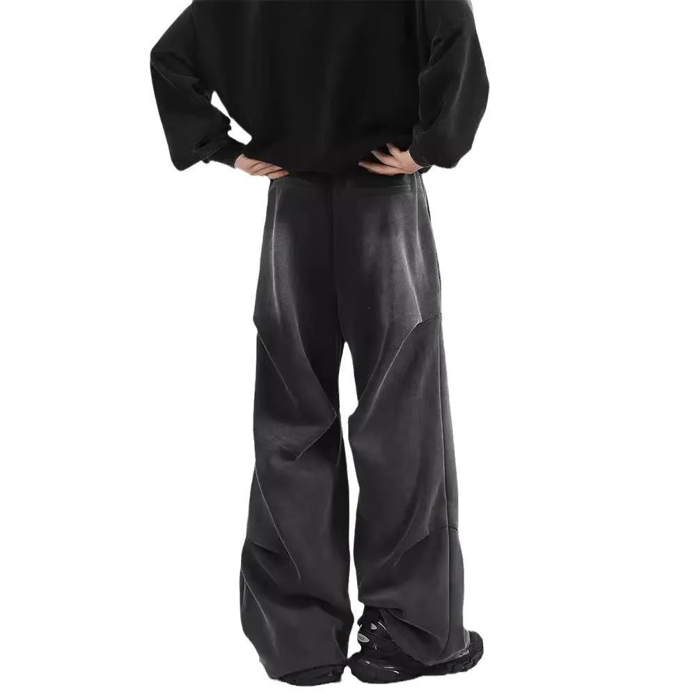 Men's pleated straight loose sweatpants in black and grey, cotton fabric, elastic waist, American washed finish.