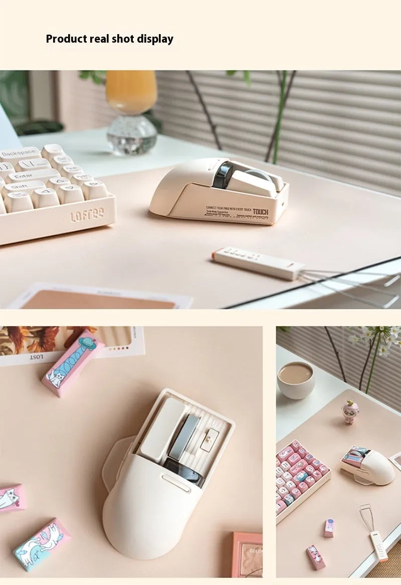 Tofu coloured Xiaoqiao wireless mouse on a desk, showing its ergonomic shape and seven buttons.