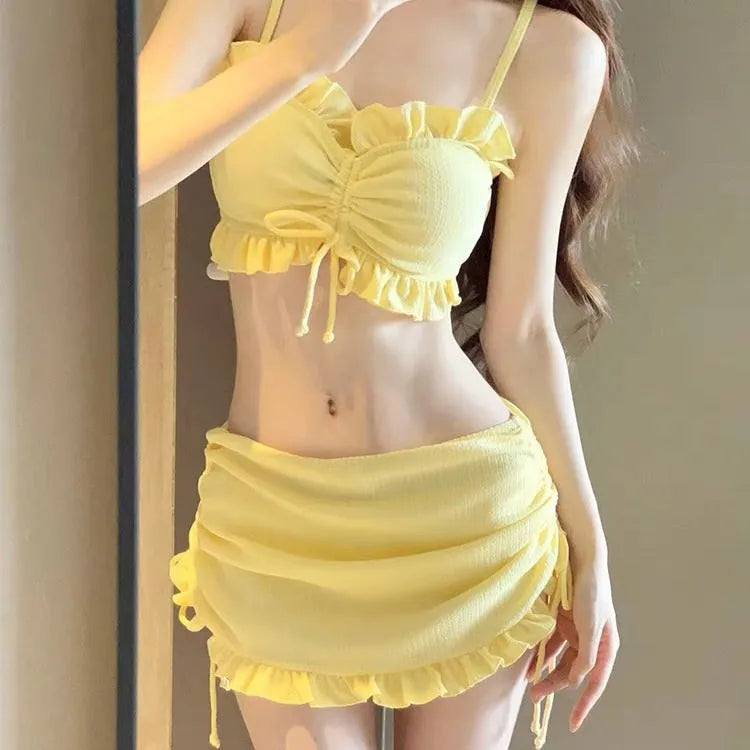 Women's milk silk bikini split swimsuit in solid colour, showing separate top and pants.