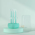 Silicone pet toothbrush for dogs and cats in blue, green, and purple colours on a white background.