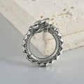 Large geometric dragon-shaped hollow out earrings in antique silver finish.