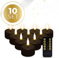 Set of four black coloured LED flameless tealight candles.