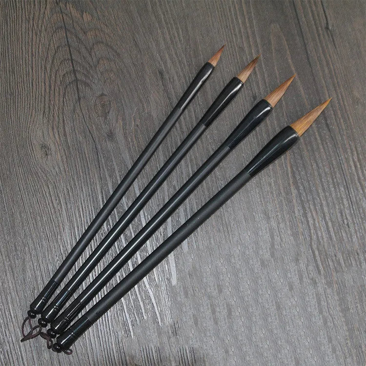 Traditional Chinese student writing brush with Jianhao nib on steel pipe barrel measuring 23cm length