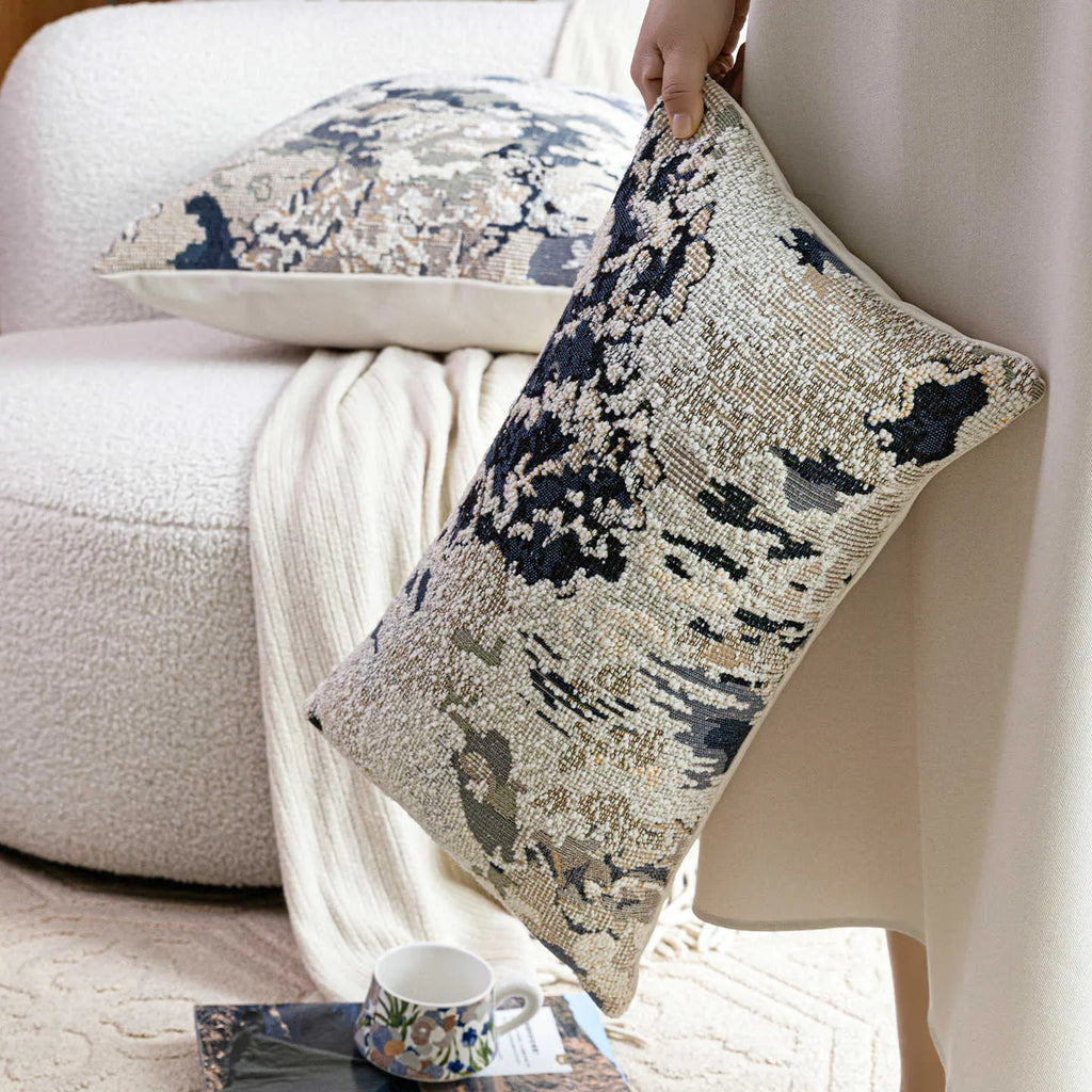 Chinese style antique blue floral pattern decorative cushion with wool blend cover on a sofa.