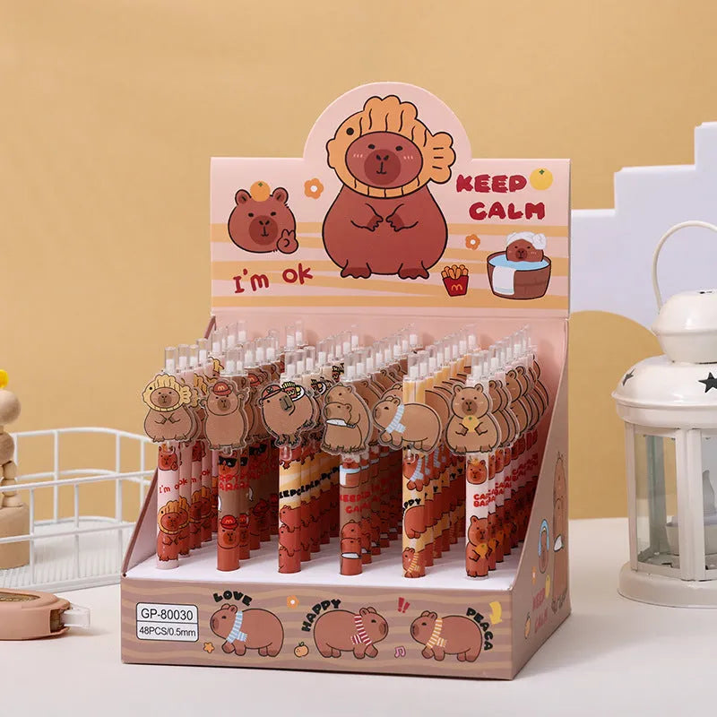 Box of 48 cartoon bear gel pens with black ink and plastic shells.
