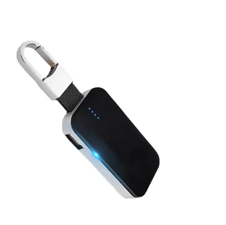 Black Apple Watch keychain power bank showing compact size and key ring attachment.