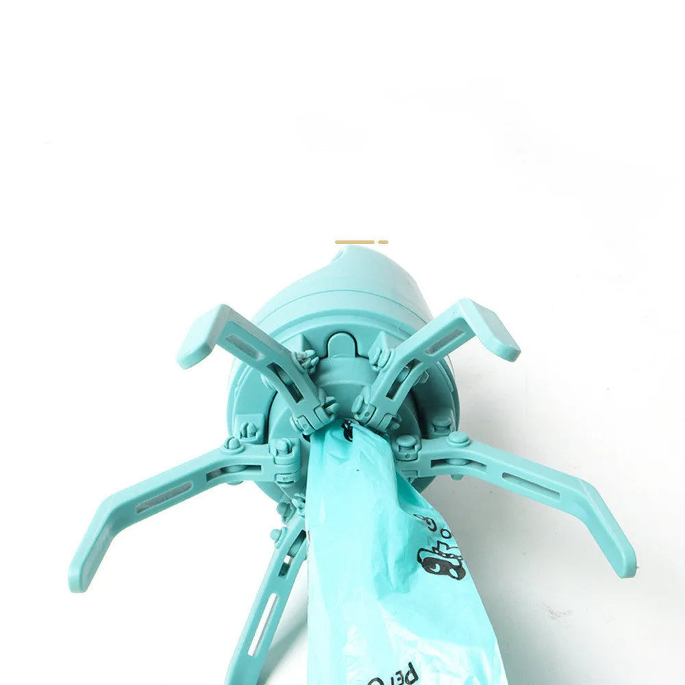 Blue plastic dog pooper scooper with eight-claw shovel and built-in bag dispenser