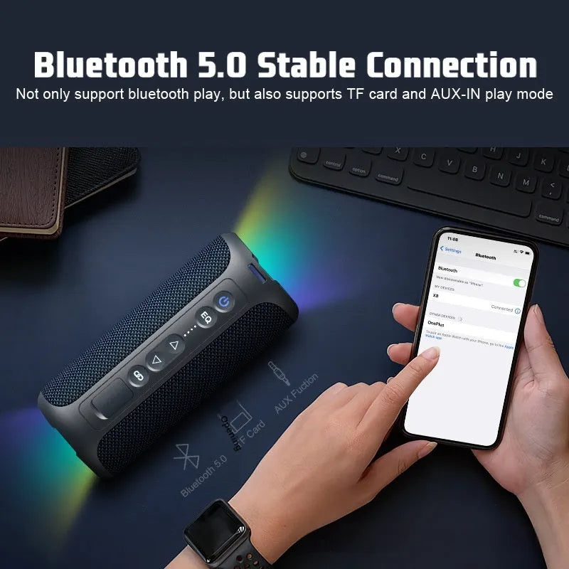Black and blue fabric wireless Bluetooth speaker with LED lighting and waterproof casing