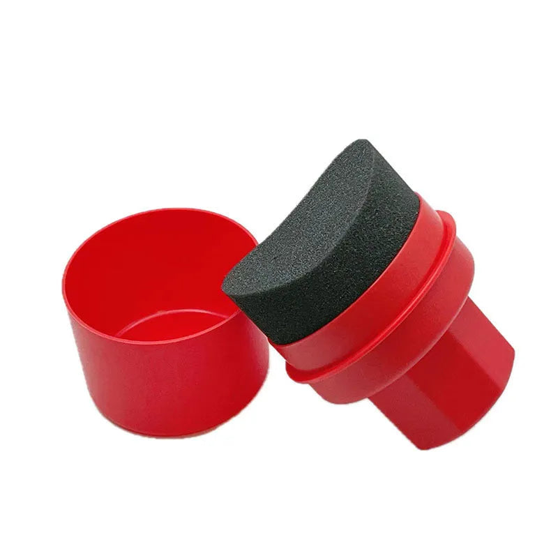 Hand-held black car tyre polishing sponge brush with a lid, showing its compact size and sponge head.