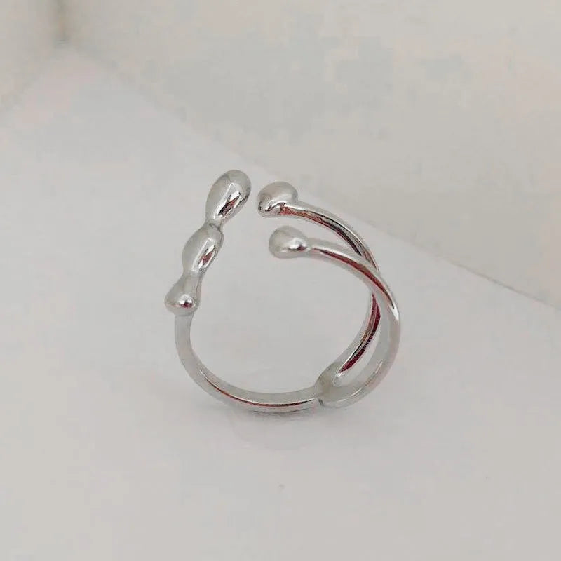 Brass adjustable circle ring with spherical design in gold finish
