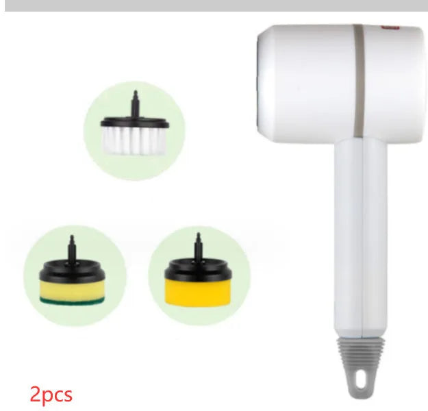 White rechargeable electric cleaning brush with multiple scrubber heads on a kitchen worktop.