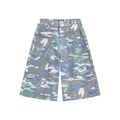 Denim camouflage cropped trousers with straight leg and utility pockets on mannequin