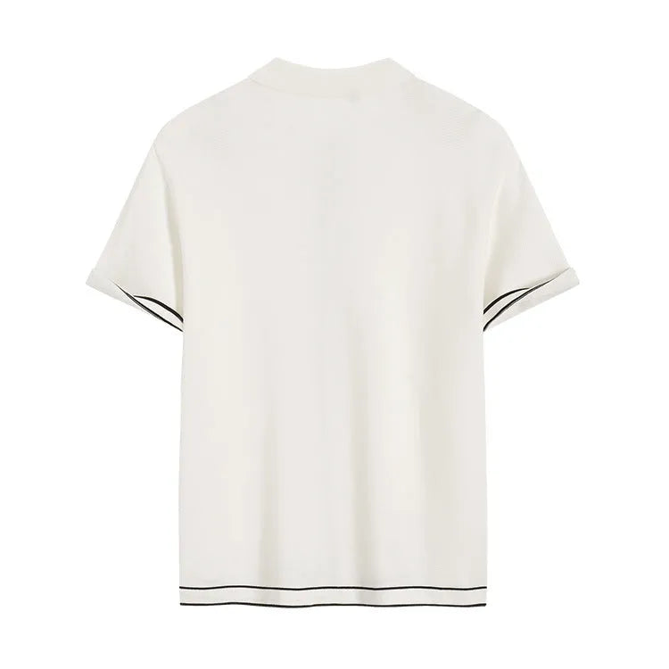White short sleeve cardigan with contrasting lapels on a hanger