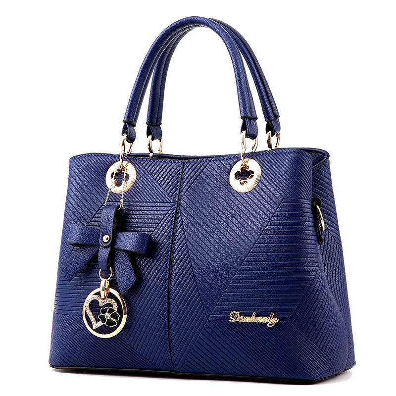 Retro PU handbag with zip closure and shoulder strap in multiple colours.