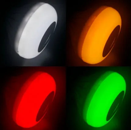 White smart LED bulb with Bluetooth speaker and remote control for colour changing lights.