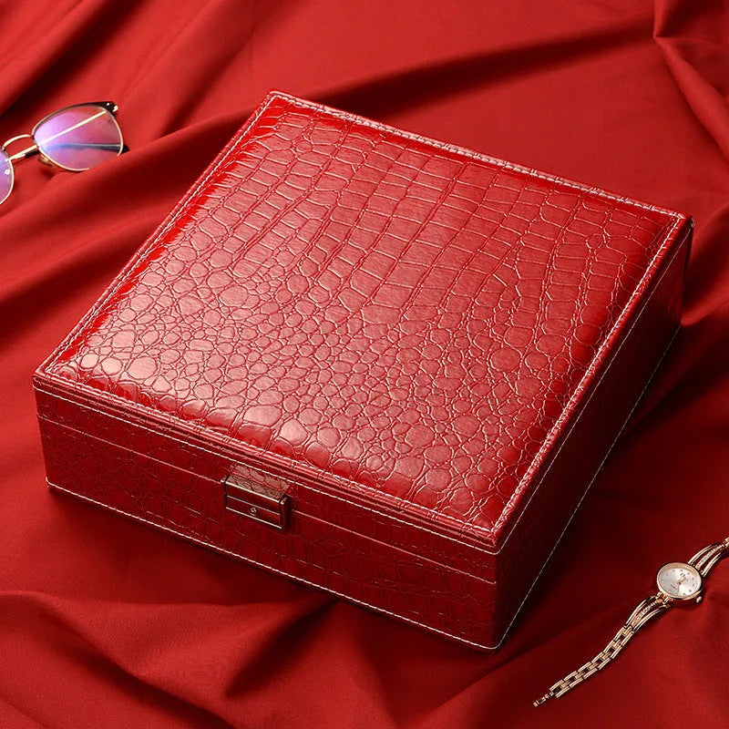 Green leather double layer jewellery storage box with a lock and crocodile pattern texture