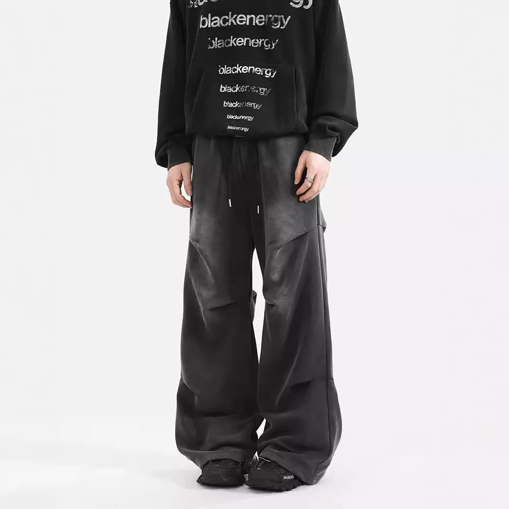 Men's pleated straight loose sweatpants in black and grey, cotton fabric, elastic waist, American washed finish.