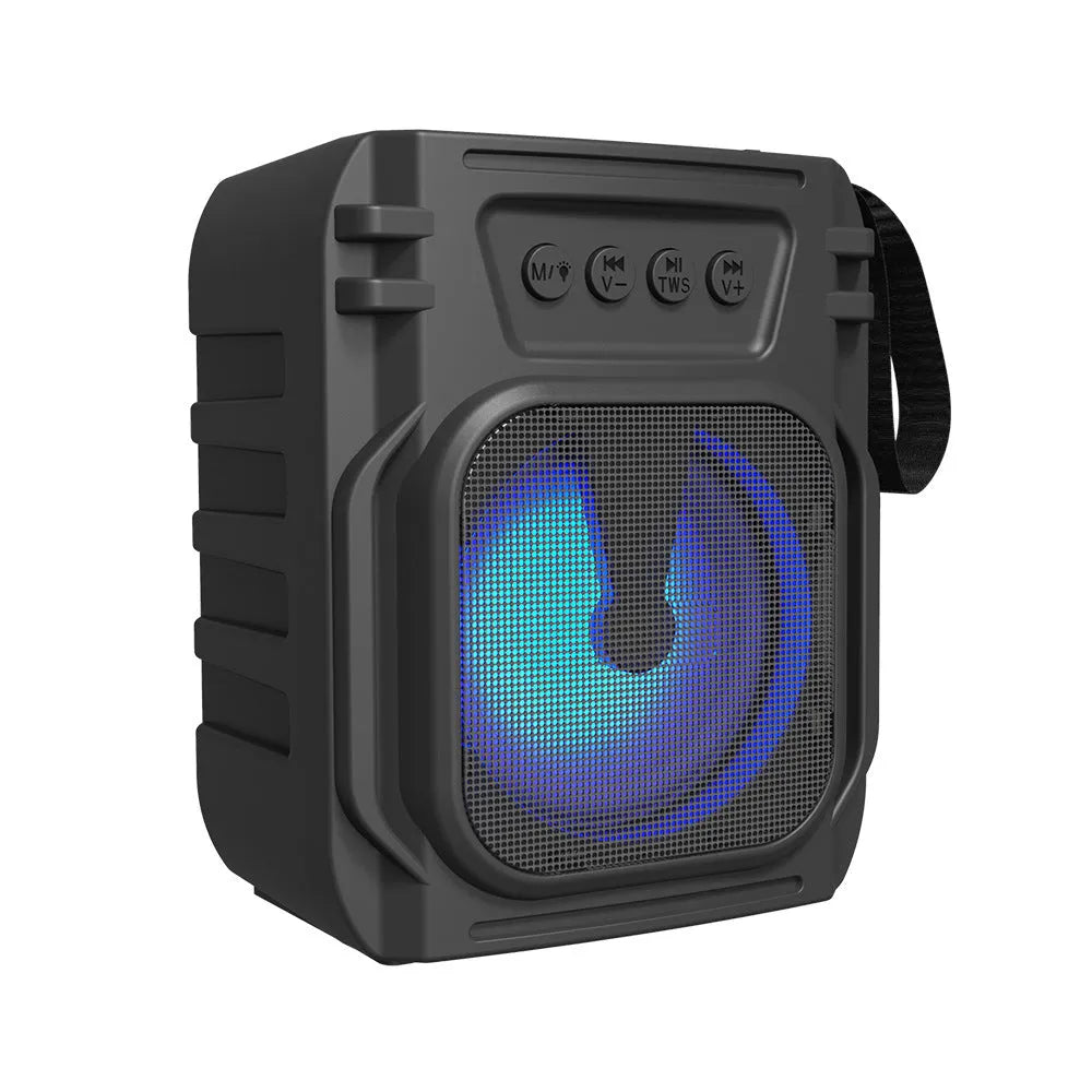 Portable Bluetooth speaker with compact design and USB charging cable