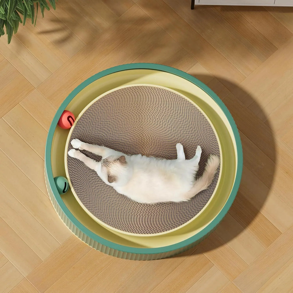 Large circular green cat scratching board with built-in ball toys and a replaceable cardboard core.