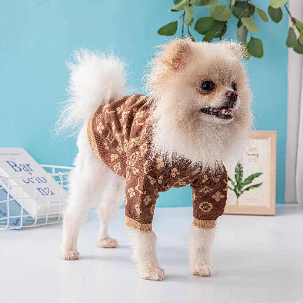 A thick wool dog sweater for winter in a choice of monochrome or two colours, shown in size L.
