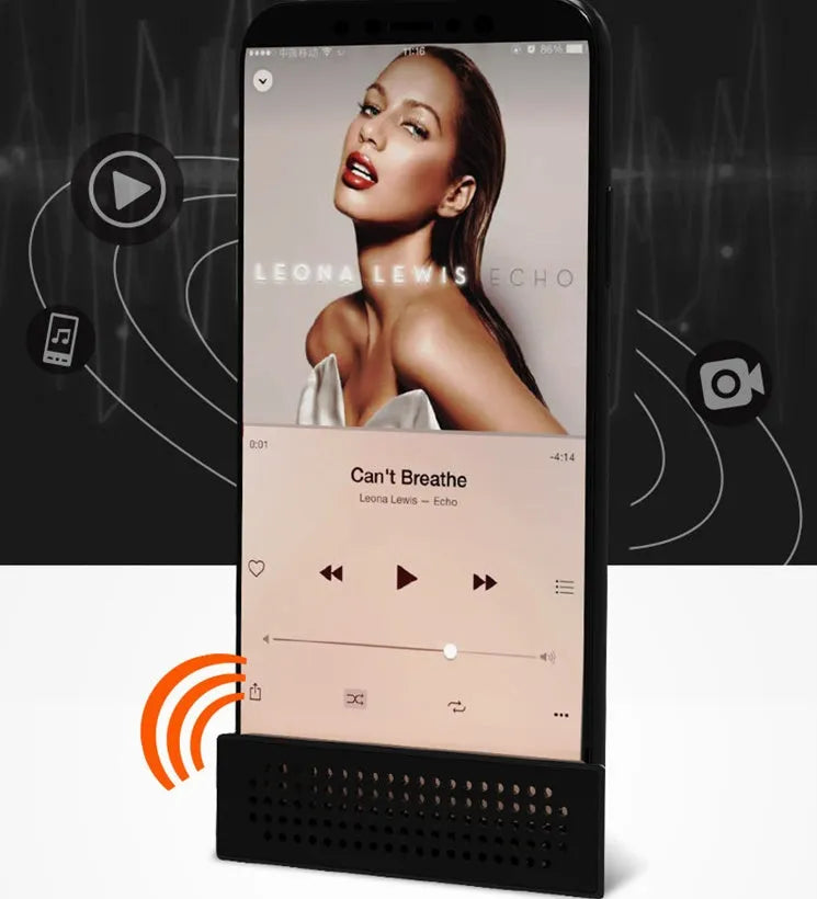 Mini pink phone amplifier holder for iPhone on desktop showing horizontal and vertical positioning