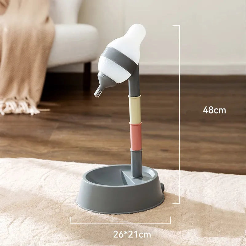 Green adjustable standing water dispenser for pets with detachable pole and ball-tip nozzle.