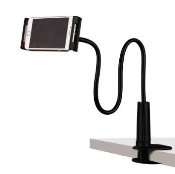 Black bedside phone handset with a long aluminium arm holding a mobile phone on a table.