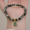 Women's natural crystal bracelet with green phantom quartz heart pendant and pearl accents