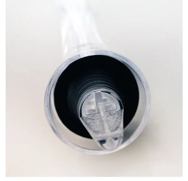 Compact clear acrylic wine aerator with a stainless steel filter inside, measuring 16cm.