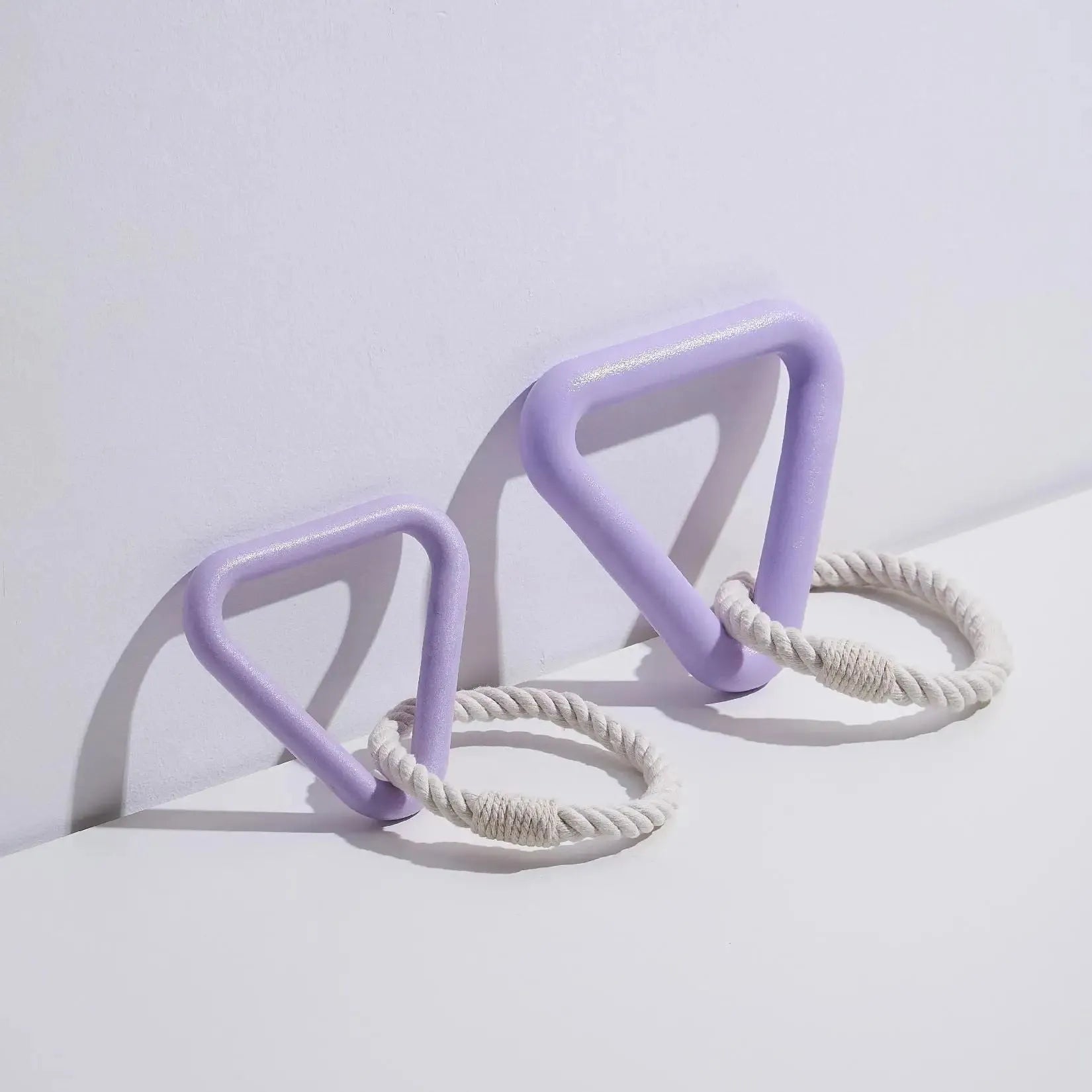 Large triangular cotton rope pull ring pet toy with a long leash in beige, pink, or purple colour options.
