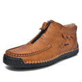 Men's black slip-on leather loafers with round toe and rubber sole on a white background