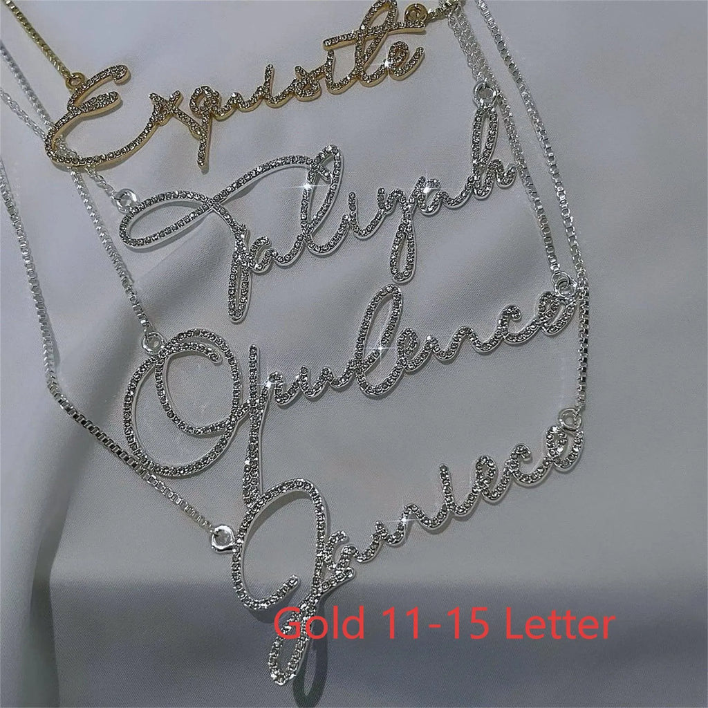 Personalised stainless steel name necklace with diamond-studded English letters on a chain.