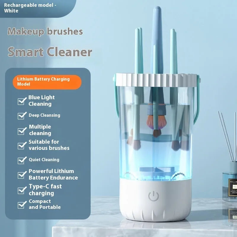 White rechargeable makeup brush cleaning device with USB cable.