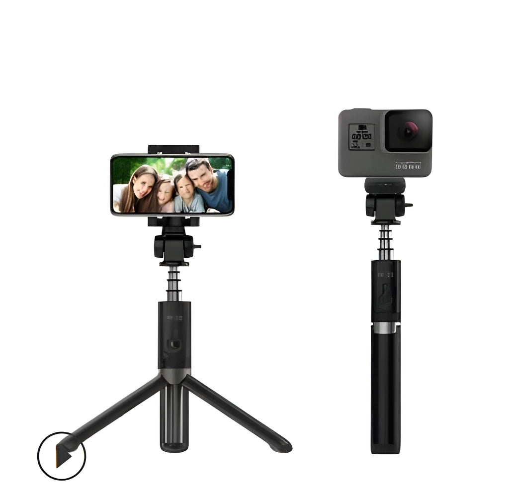 Aluminium alloy Bluetooth selfie stick with remote control and adjustable phone clip next to a smartphone