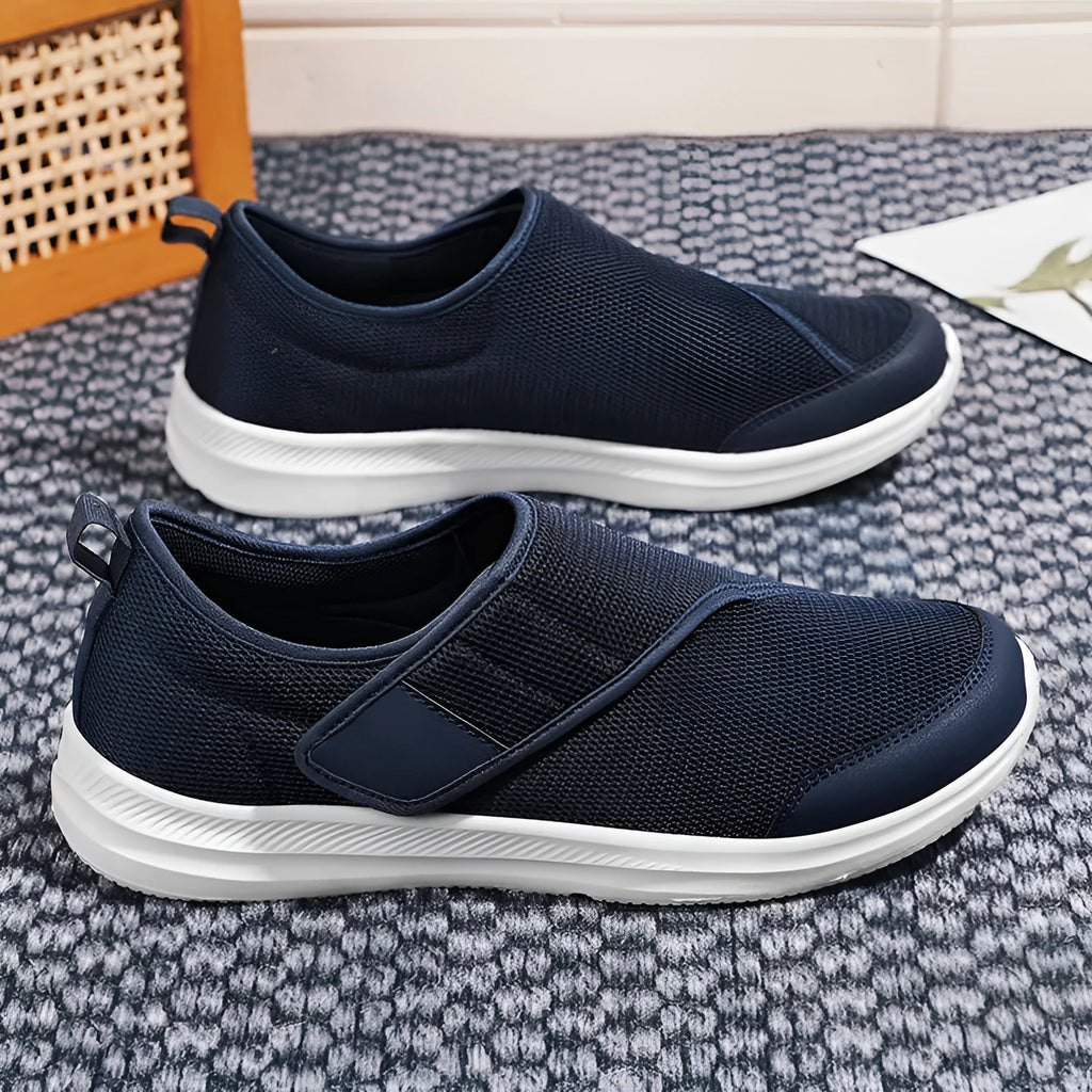 Round-toe mountaineering walking shoes with mesh upper and Velcro strap in multiple colours.
