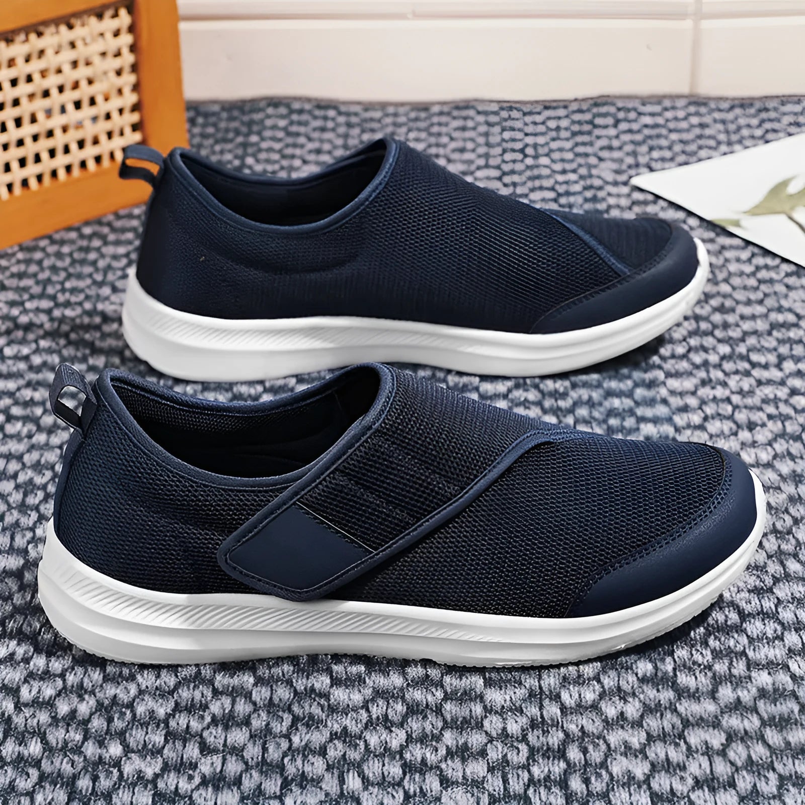 Round-toe mountaineering walking shoes with mesh upper and Velcro strap in multiple colours.