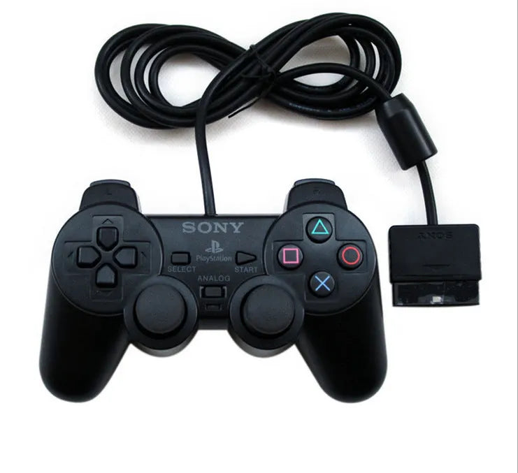 PS2 wired USB game controller with vibration feedback in neutral bare metal finish