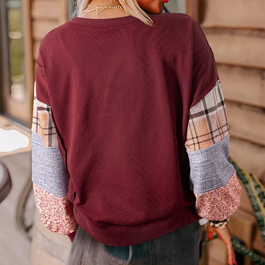 Women's long-sleeved polyester pullover top with plaid stitching pattern in loose fit