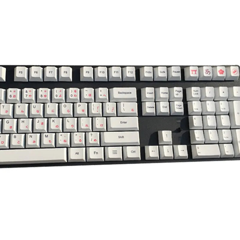 Set of PBT keyboard keycaps with Japanese, Russian, and Korean thermal sublimation legends, showing a five-sided spacebar.