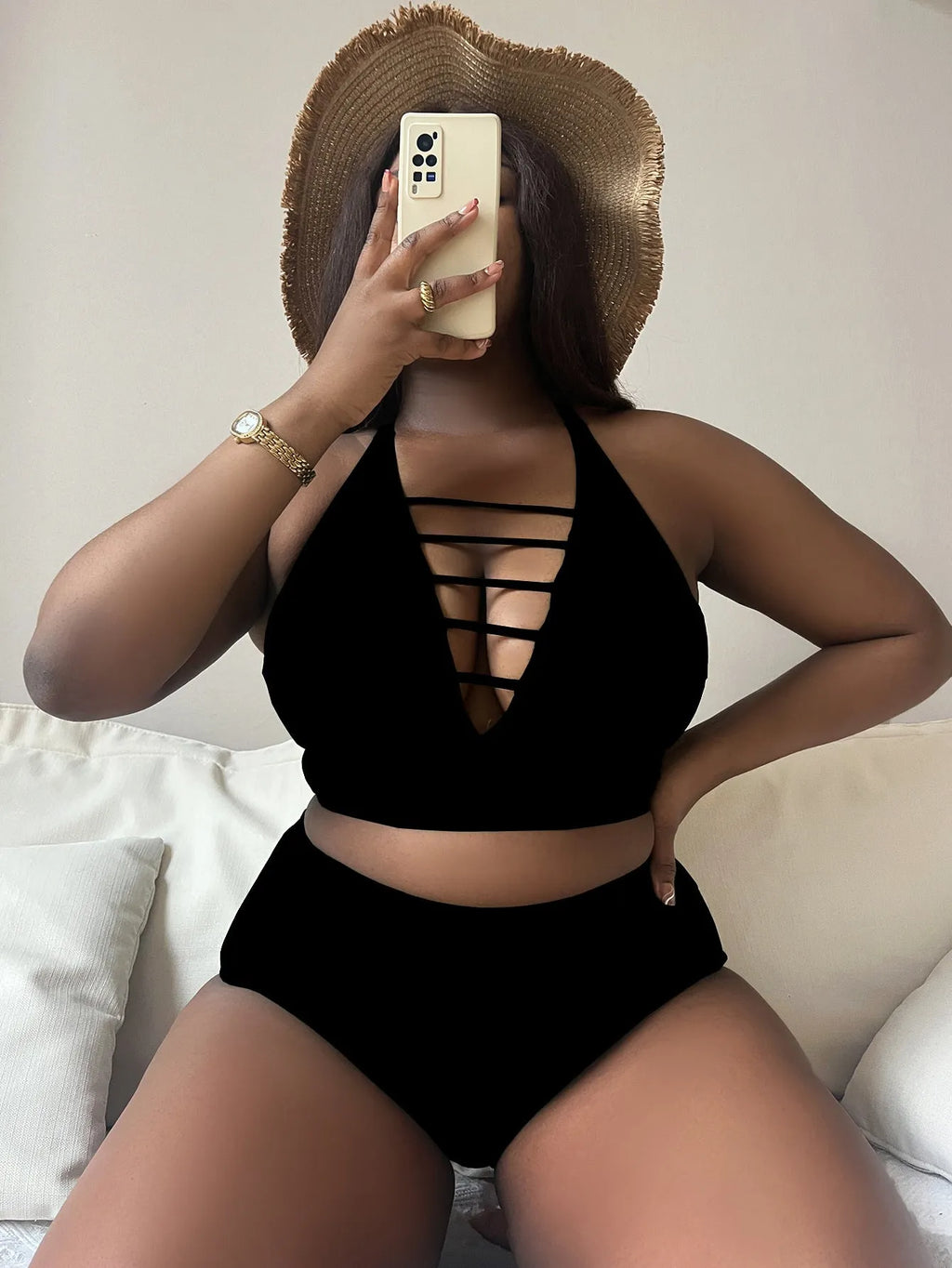 Plus size halter bikini with adjustable straps and high-waisted briefs in solid colour