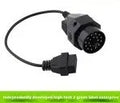 BMW 20-pin to OBD2 16-pin diagnostic adapter cable connector on a white background