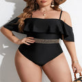 Black solid colour women's one-piece polyester swimsuit on a hanger.