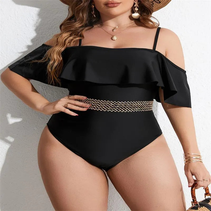 Black solid colour women's one-piece polyester swimsuit on a hanger.