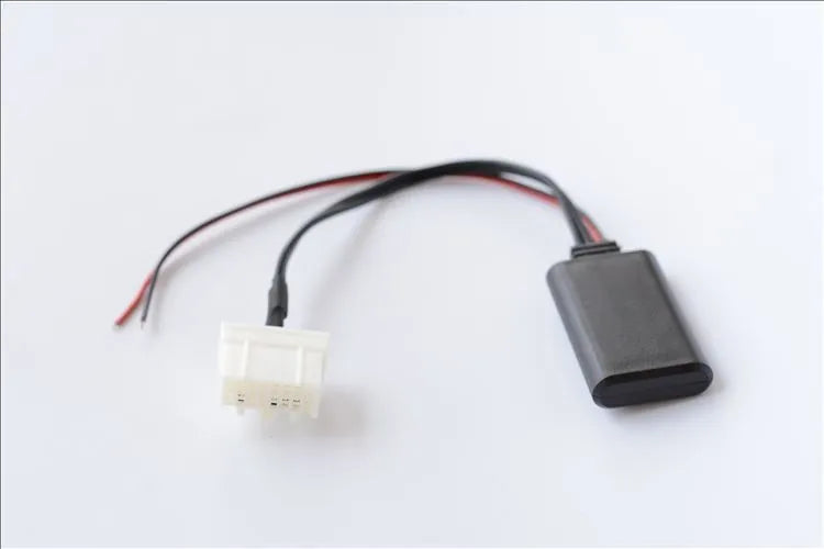 Black Bluetooth audio adapter cable for Mazda cars with aux and MEDIA button.