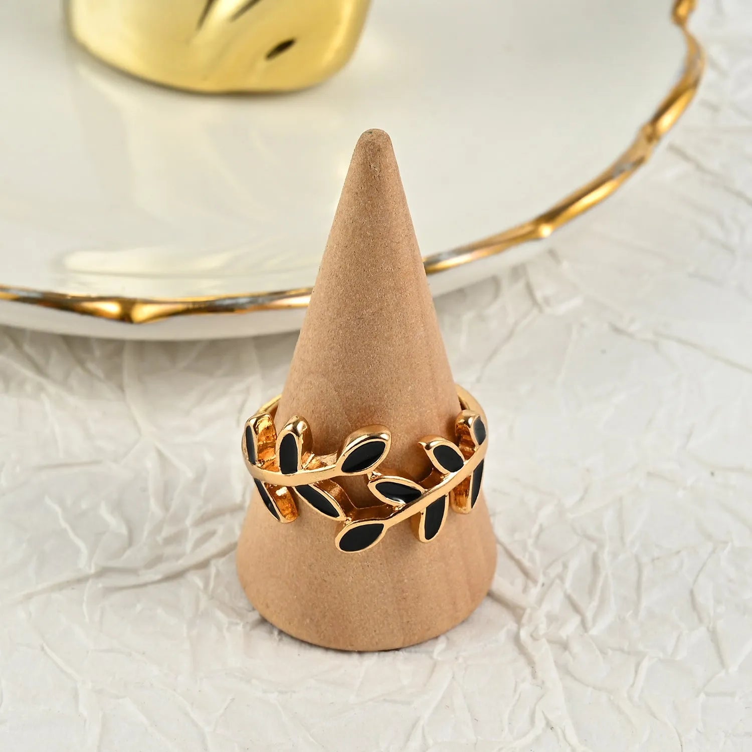 Gold electroplated geometric leaf ring with floral elements for women's index finger