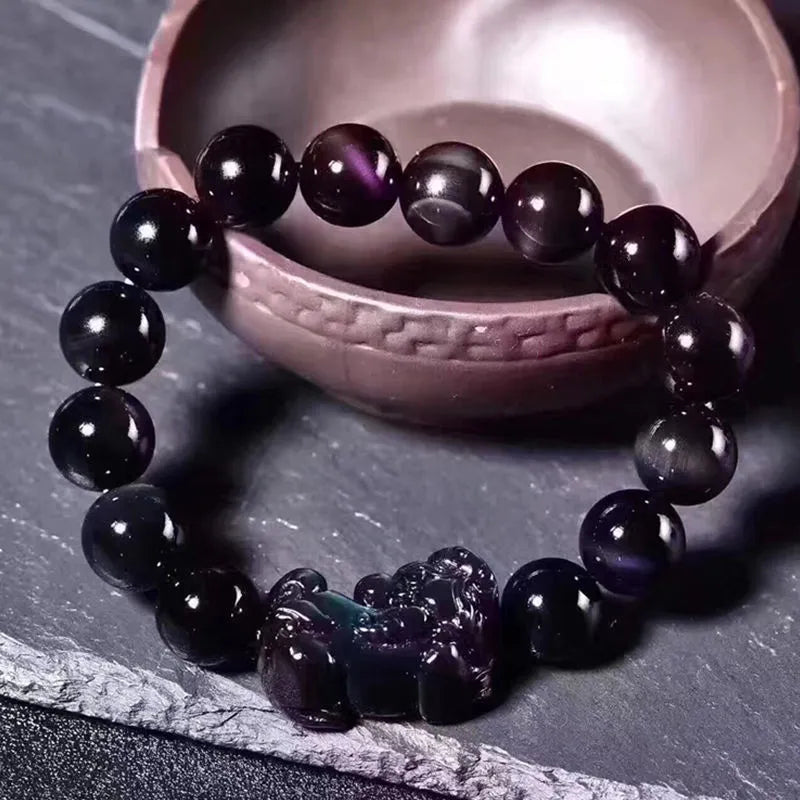 Natural eye obsidian bracelet with grey and black banding, showing multiple bead size options