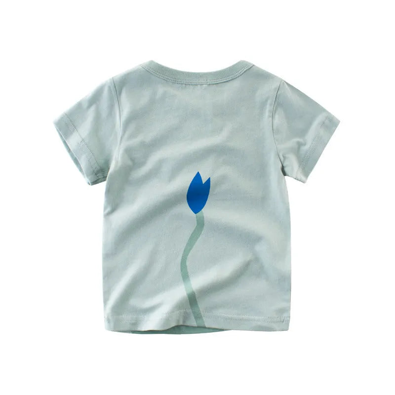 Children's green lion print cotton T-shirt on a hanger, showing crew neck and short sleeves.