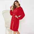 Women's solid colour A-line midi dress with long sleeves and an elastic waistband with a belt.
