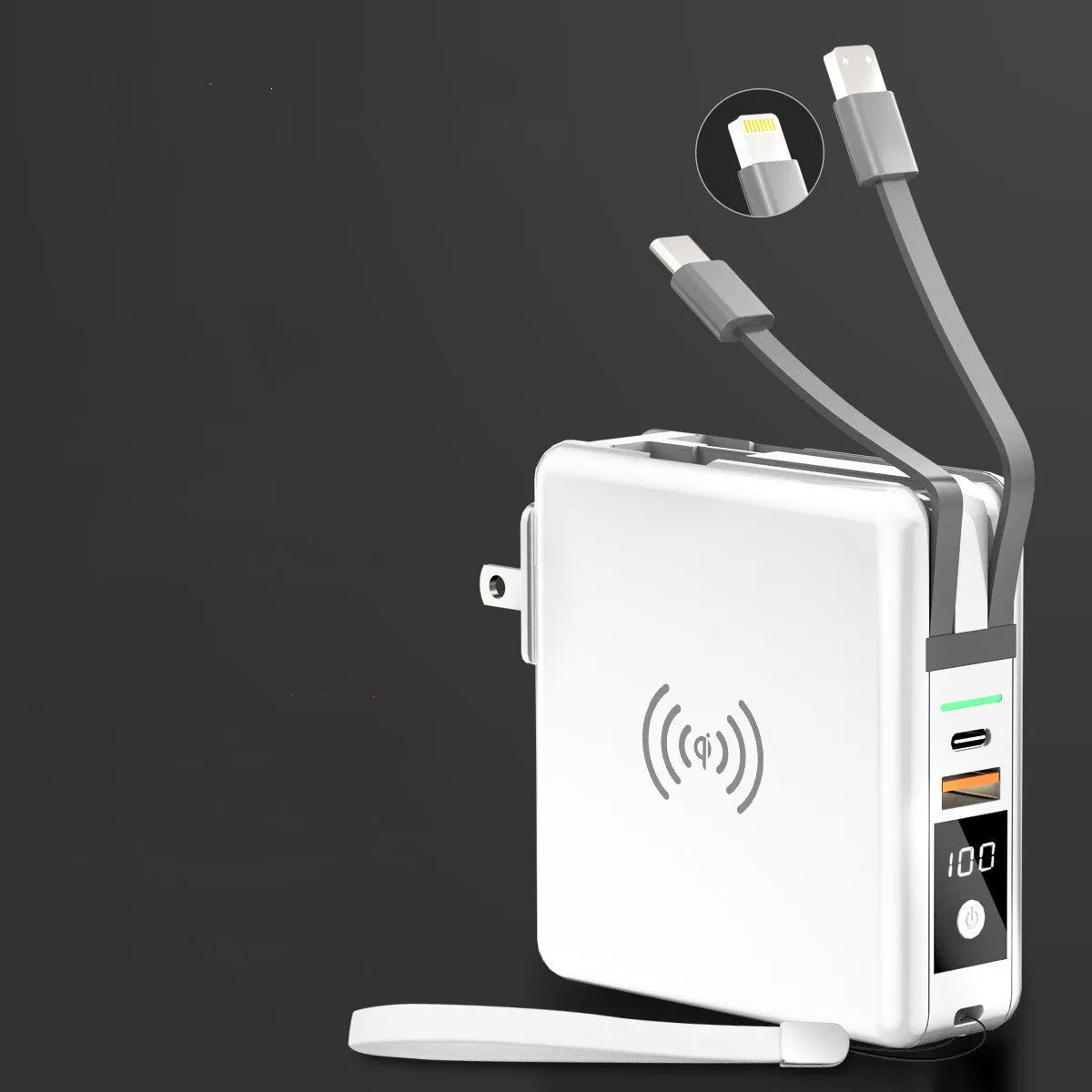 Black and white portable power bank with flip-out international plug adaptors showing PD20W and Qi wireless logos.
